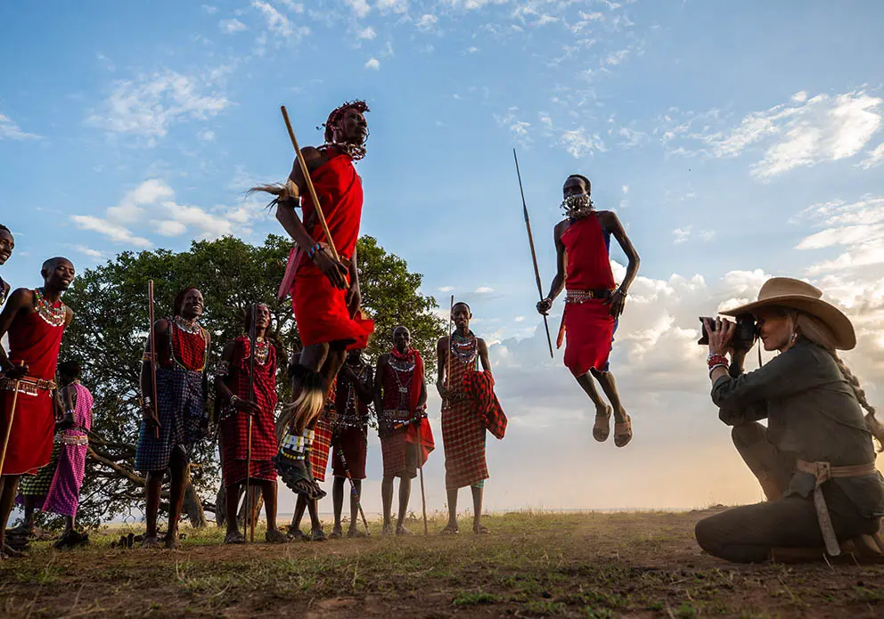 Cultural interaction during Kenya safari tours - guests during Masai Village visit