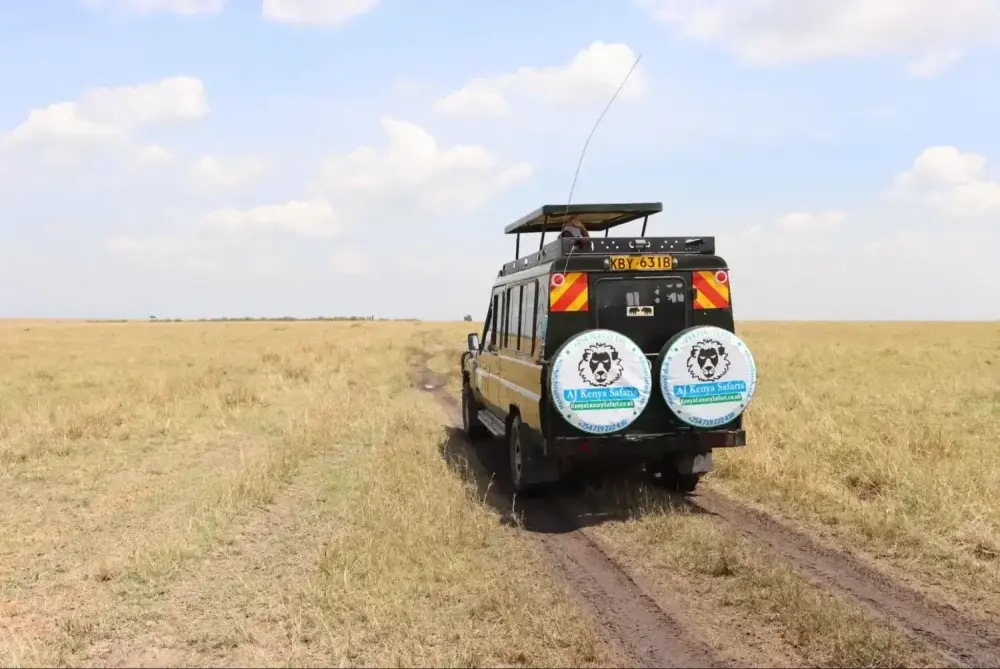 Masai Mara Trip Cost - Our safari land cruiser in the reserve during a game drive